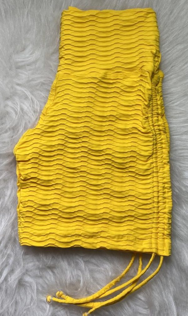SHORT LEVANTA COLA AMARILLO-TALLE UNICO